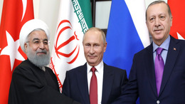 The Presidents of Iran, Russia and Turkey - Hassan Rouhani, Vladmir Putin and Recep Tayyip Erdogan - shake hands at a summit in the Russian city of Sochi.