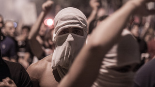 masked demonstrator