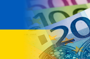 Ukraine flag with bank notes.