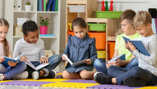 Cute little children reading books in playroom(© pixel-shot.com (Leonid Yastremskiy))