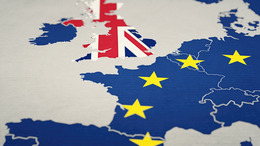  Great Britain leaves the European Union.  Map of Great Britain in the Union Jack and Europe in the EU flag.