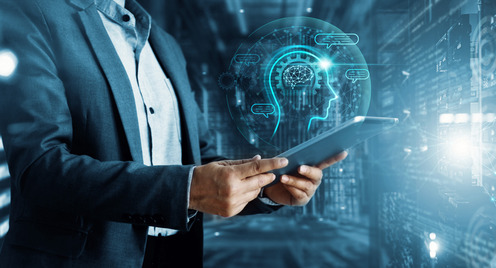 A businessman holding a tablet and using AI for analysis