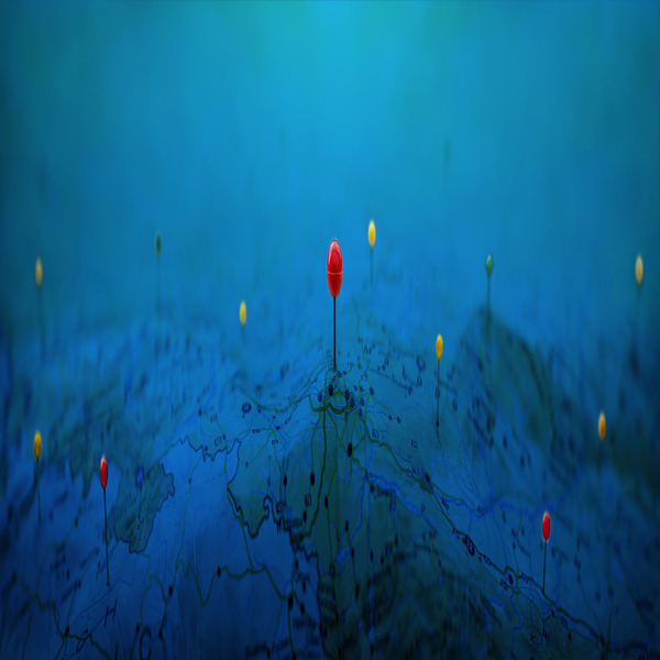 Pins on a geographic map curved like mountains. Pinning a location on a map with mountains. Adventure, discovery, navigation, geography, mountaineering, rock climbing, hike  and travel concept background.(© stock.adobe.com/Tryfonov)