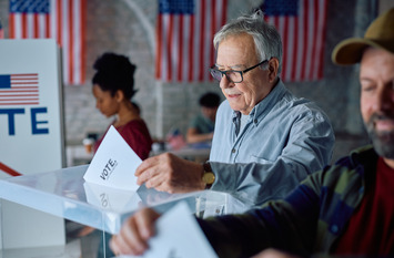Amerian people with voting papers.