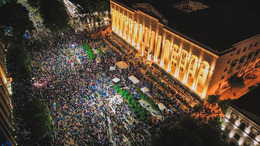 Bird's-eye view of the square in front of the Georgian parliament in Tbilisi, where many protesters are assembled.
