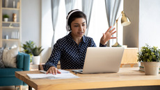 Indian student wear headphones use laptop e-learning remotely by videocall(© © fizkes - stock.adobe.com)