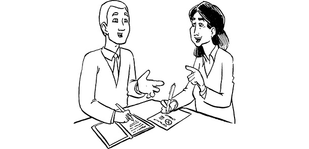 Zwei Mitarbeiter der Bertelsmann Stiftung, maennlich, weiblich, reden an einem Tisch