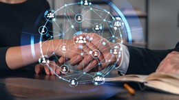 Business handshake with digital network overlay, office background