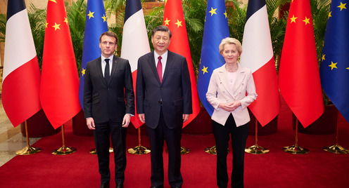From left: French President Emmanuel Macron, Chinese President Xi Jinping and EU Commission President Ursula von der Leyen pose for a photo during their meeting in Beijing on 6 April 2023.