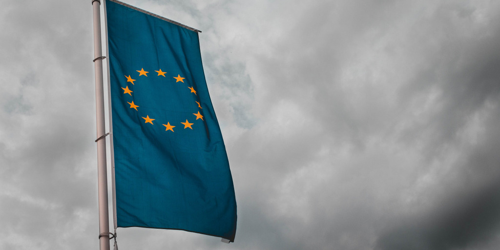 EU flag with cloudy background