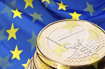 Euro Coin and European Flag