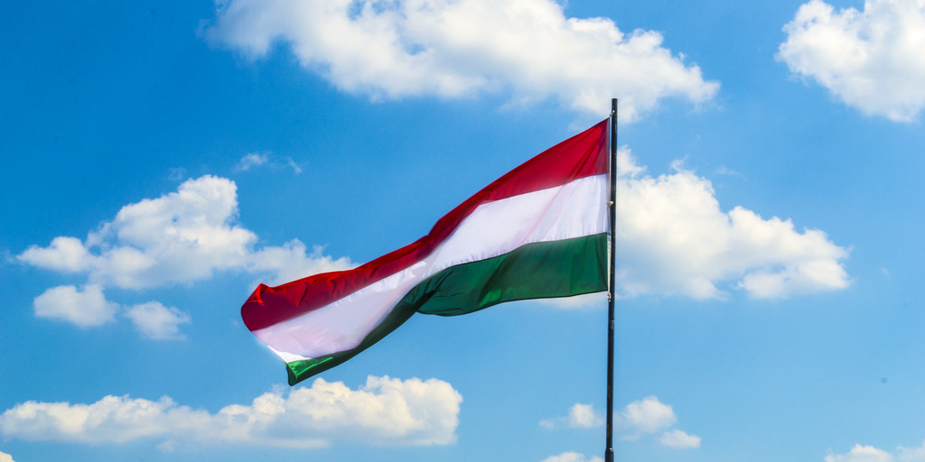 The national flag of Hungary is blowing in the wind.