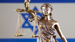 Symbol of law and justice with Israel Flag. Close up.