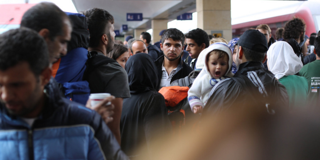 Flüchtlinge auf dem Bahnsteig