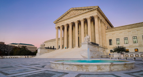 The United States Supreme Court at dusk.