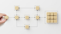 Wooden cubes arranged in a certain way with lines like in an electric circuit model