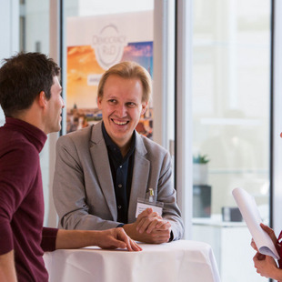 participants from different nations in discussion