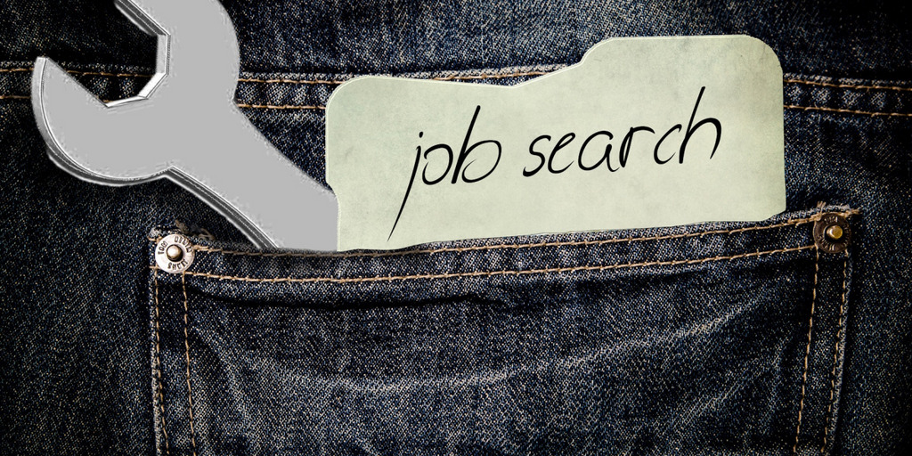 Pocket with tools and a piece of paper saying that a job is wanted