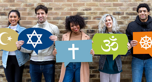 Five people are holding signs carrying the symbols of Islam, Christianity, Judaism, Hinduism and Buddhism.