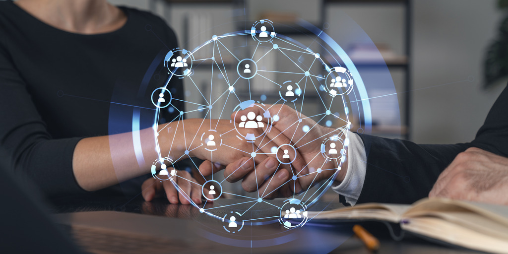 Geschäftliches Hände-Schütteln mit digitaler Netzwerk-Überlagerung