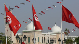 Government building in Tunis, Tunisia, with Tunisian flags all around.