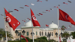 Government building in Tunis, Tunisia, with Tunisian flags all around.