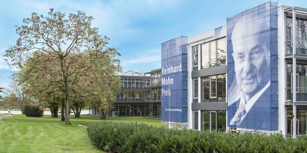 Bertelsmann Stiftung building with Reinhard Mohn Prize banner