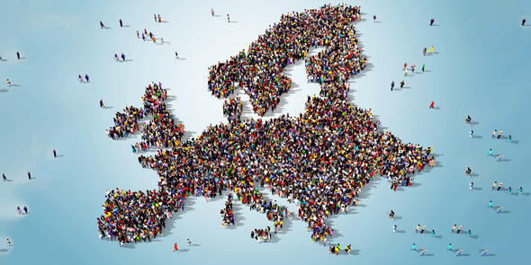 Group of People forming Map of Europe