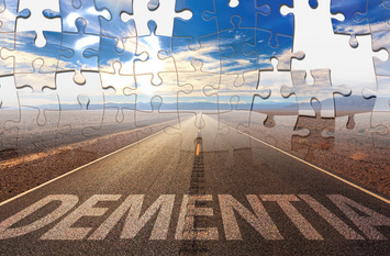 Eine lange Straße mit Himmel als Puzzle dargestellt, am Anfang steht das Wort Dementia geschrieben