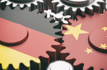 China and Germany flags on metal gears