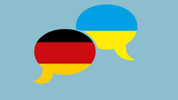 zwei Sprechblasen nebeneinander, eine in den Farben der ukrainischen Flagge, die andere in den Farben der deutschen Flagge