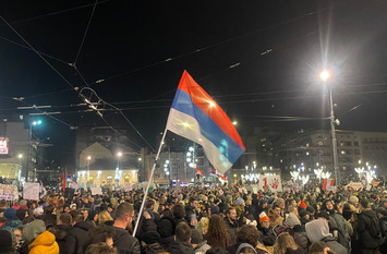 Protestors gather up in Belgrade in December 2024. Photo by Stefan Milju&scaron; (Voice of America) / Wikimedia Commons &ndash; CC0 1.0, Public Domain, https://creativecommons.org/publicdomain/zero/1.0/legalcode