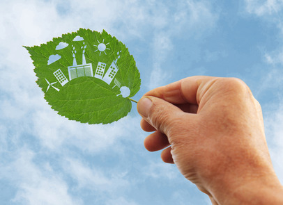 hand holding Green energy concept, cut the leaves of plants