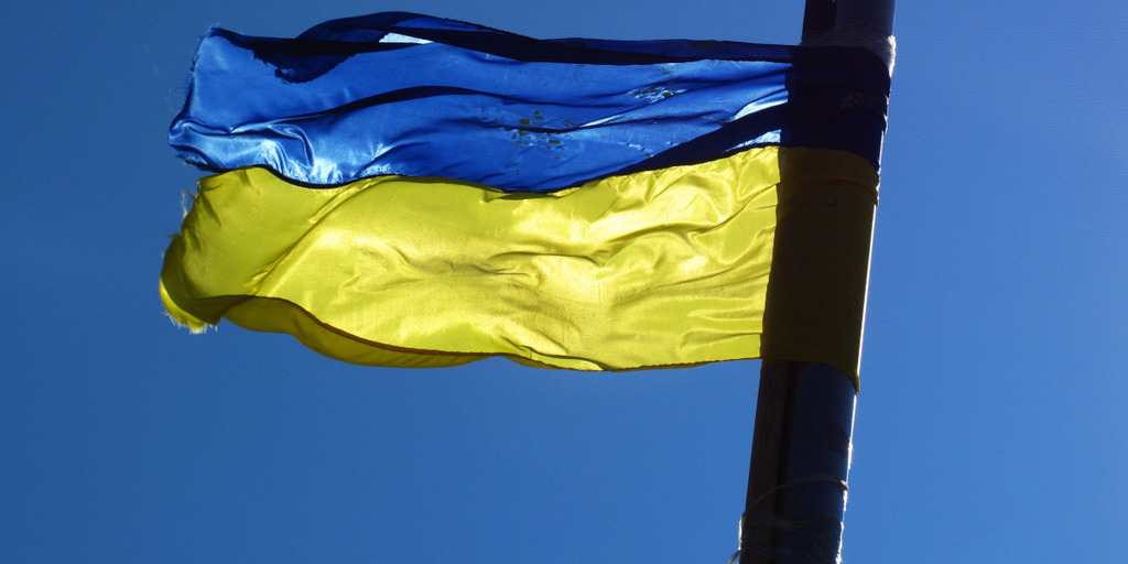 An Ukrainian flag is blowing in the wind. 