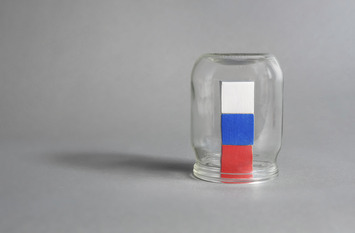Economic sanctions russia closed in glass jar.