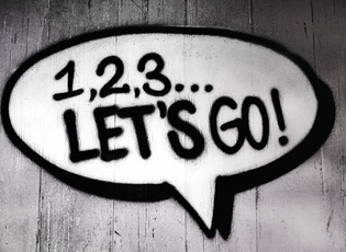 Auf einer Tafel steht 1, 2, 3, ... Let´s Go!