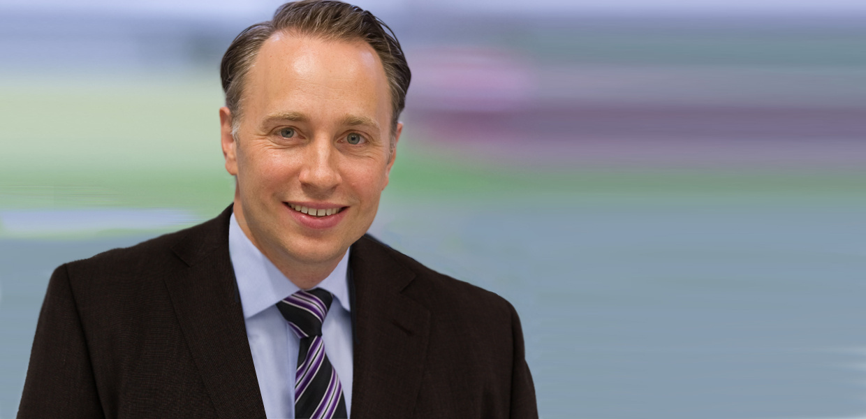 Dr. Thomas Buberl