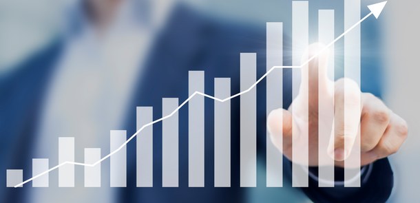 Business success with growing, rising charts.